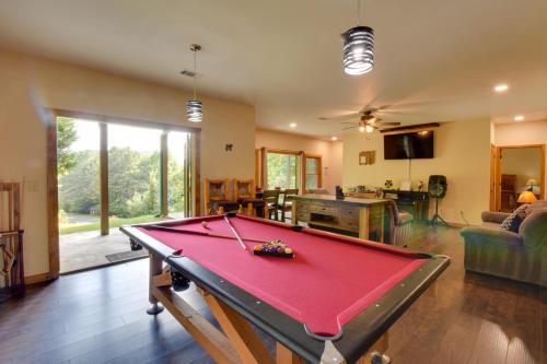 a living room with a pool table in it at Hot Tub, Game Tables and Mtn Views Ellijay Cabin in Ellijay