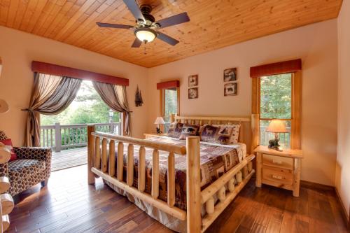 a bedroom with a bed and a wooden ceiling at Hot Tub, Game Tables and Mtn Views Ellijay Cabin in Ellijay