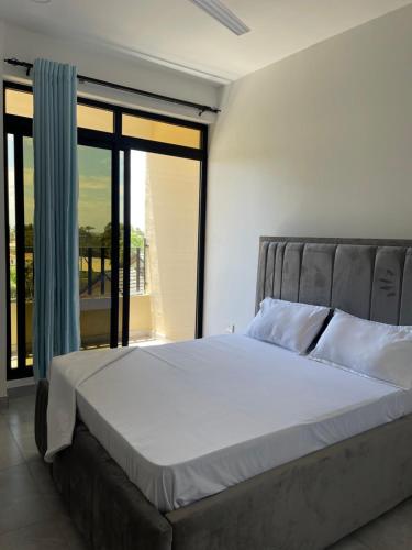 En eller flere senge i et værelse på Fortune Zone