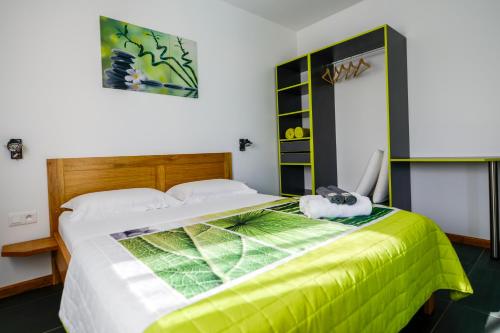 Postel nebo postele na pokoji v ubytování LE MALAYA