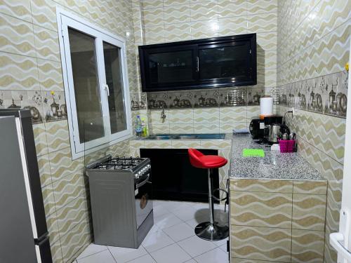 Η κουζίνα ή μικρή κουζίνα στο Résidences PRIMIS Thiès - appartements et chambres