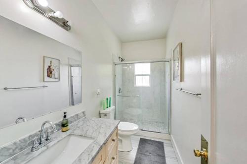 a bathroom with a shower and a sink and a toilet at Best Location 3BR by UCBerkeley in Berkeley