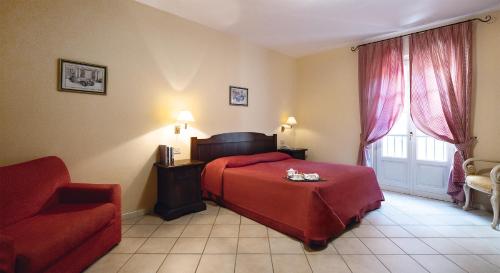Postel nebo postele na pokoji v ubytování Residenza dei Fiori