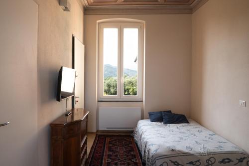 Postel nebo postele na pokoji v ubytování Villa Smeralda - Luxury on the Italian Riviera