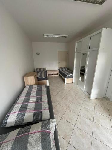a bedroom with two beds in a room at Ubytování Pardubice Trnová in Pardubice