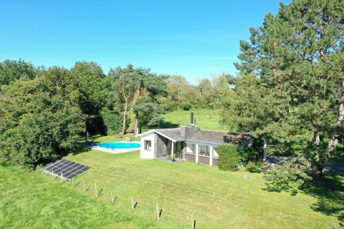 an aerial view of a house with a swimming pool at Sy - Les Aywisses in Ferrières