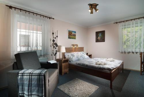 Postel nebo postele na pokoji v ubytování Pension Luky