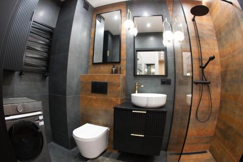 Koupelna v ubytování Apartament POSEJDON Gliwice