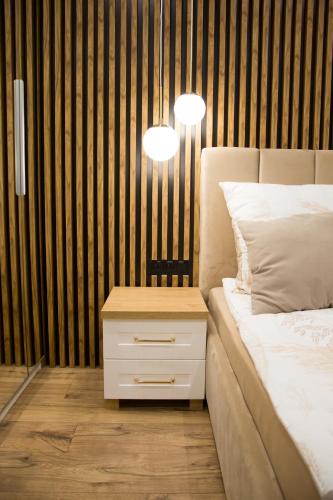 Postel nebo postele na pokoji v ubytování Apartament POSEJDON Gliwice