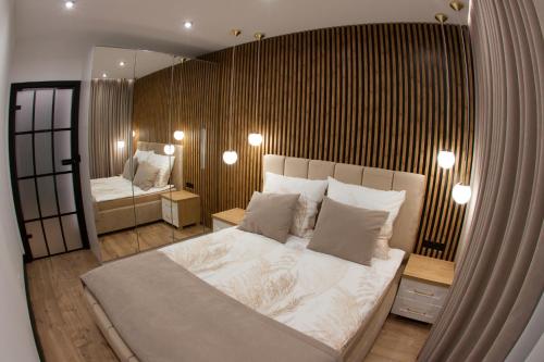 Postel nebo postele na pokoji v ubytování Apartament POSEJDON Gliwice