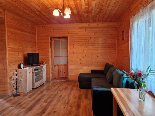 Kuchyň nebo kuchyňský kout v ubytování Domek w Krzewinie