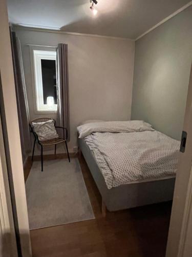 Postel nebo postele na pokoji v ubytování Lykkebo