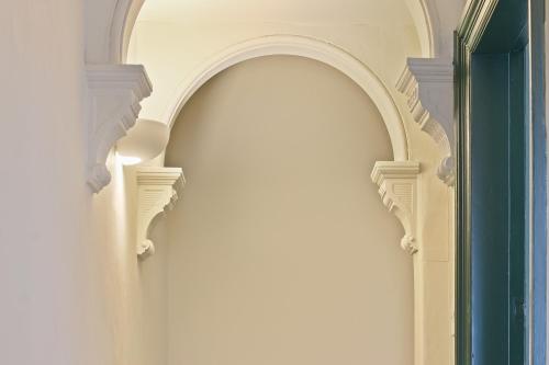 an archway in the side of a building at Home from Home 4 Bed - Ideal for Workers & Great for Groups, FREE Parking, Spacious, Pet Friendly Netflix in Kimberworth