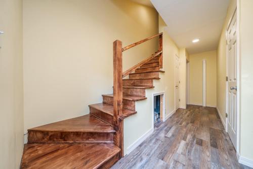 a staircase in a home with wood treads at Misty Mountain Cabin Spectacular Scenic Escape by Caddo River in Glenwood