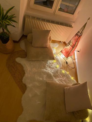 a living room with a couch covered in snow at Room next Montreux in Montreux