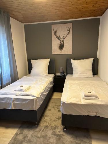 Katil atau katil-katil dalam bilik di bee Apartment: Ideal für Gruppen & Monteure