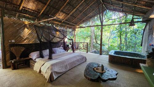 Katil atau katil-katil dalam bilik di EntreAguas Ecolodge
