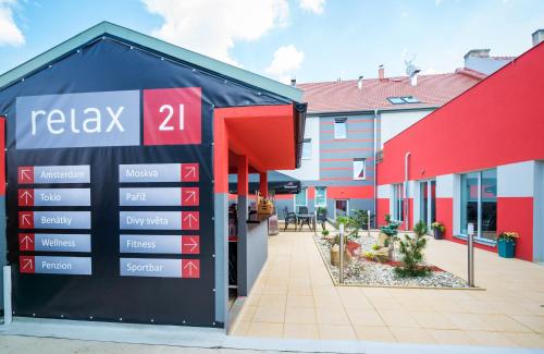 a sign in front of a building at Relax21 in Uherský Ostroh