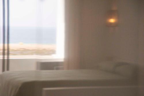 Katil atau katil-katil dalam bilik di The Sunny Flair, Relaxing Experience
