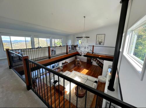an overhead view of a living room with a chandelier at The View @ Ulandi in Lowther