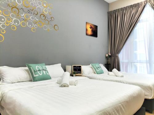 Ένα ή περισσότερα κρεβάτια σε δωμάτιο στο Mahkota Valley Suite Indera Mahkota Kuantan by WS#Netflix