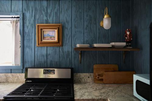 a laptop computer sitting on a counter in a room at Black Bear Lodge in South Lake Tahoe