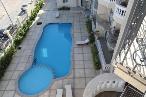 Вид на басейн у The Rooftop - Amazing apartment - Sea view - Pool - Penthouse -Jacuzzi - Sharm el Sheikh або поблизу