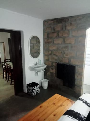 Ein Sitzbereich in der Unterkunft Prosper Stud Guest House