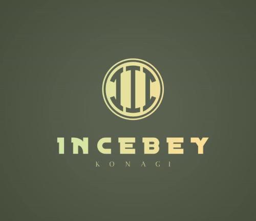 a logo for an investor company at İncebey Konak Cappadocia in Uçhisar