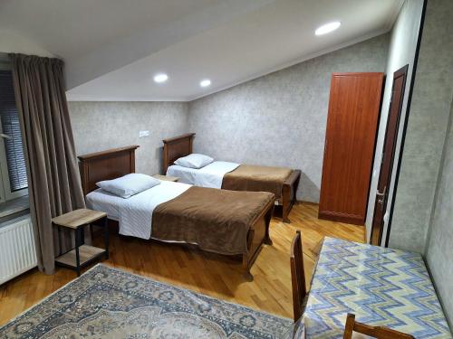 Postel nebo postele na pokoji v ubytování GUEST HOUSE 15A