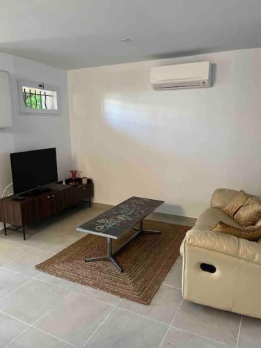 Joli T3 dans villa avec jardin et parking