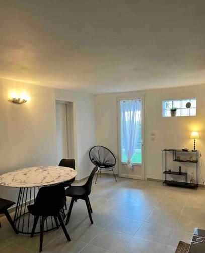Joli T3 dans villa avec jardin et parking