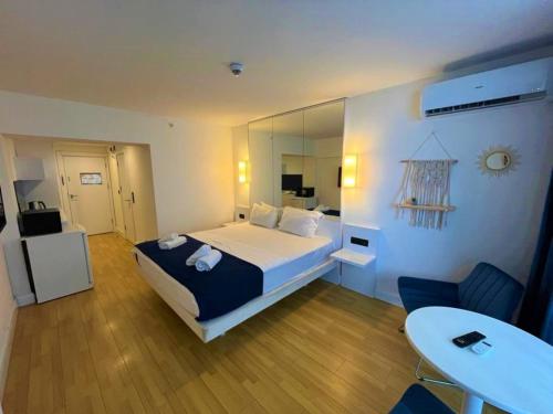 Katil atau katil-katil dalam bilik di Orbi City Beach Side Apartments
