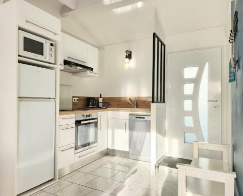 Photo de la galerie de l'établissement Maison Les Embruns avec piscine collective, à La Faute-sur-Mer