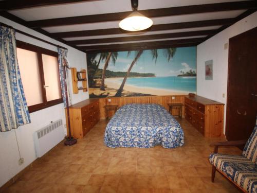a bedroom with a bed and a view of the ocean at Casa Llançà, 4 dormitorios, 8 personas - ES-228-133 in Llança