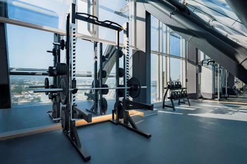 a gym with a view of the city at Radisson Blu Plaza Hotel, Oslo in Oslo
