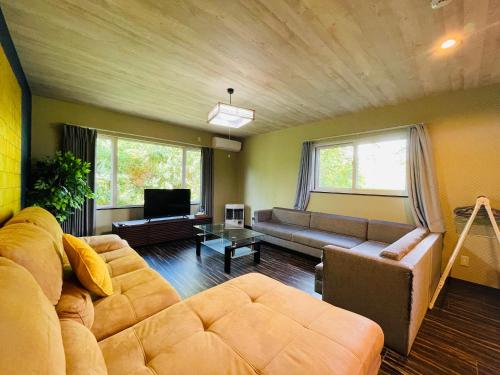Χώρος καθιστικού στο Niseko Hotel KIRAKU KAME 車利用にオススメ 各スキー場迄車で約15分