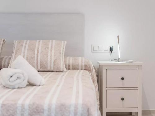 Ένα ή περισσότερα κρεβάτια σε δωμάτιο στο Casa en Sineu