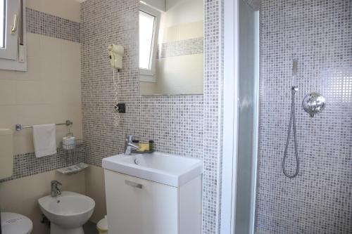Ένα μπάνιο στο Hotel La Bussola