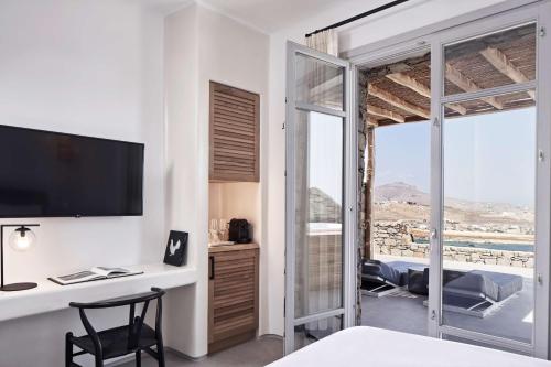 Postel nebo postele na pokoji v ubytování Radisson Blu Euphoria Resort, Mykonos
