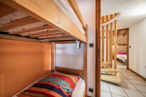 Ένα ή περισσότερα κρεβάτια σε δωμάτιο στο Chalet La Grangerie