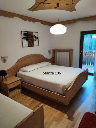 Postel nebo postele na pokoji v ubytování Hotel Pizboè