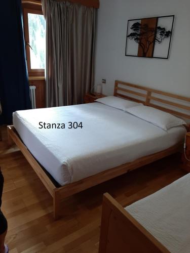 Postel nebo postele na pokoji v ubytování Hotel Pizboè