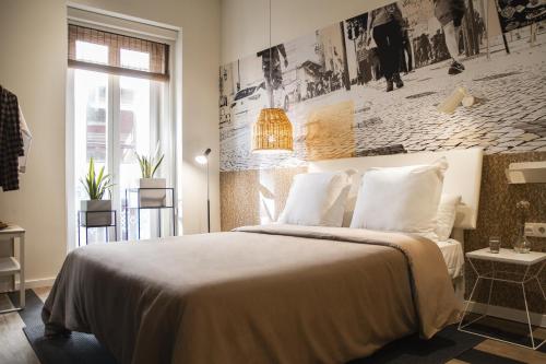 Ένα ή περισσότερα κρεβάτια σε δωμάτιο στο room Select Liberdade