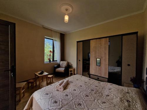 Postel nebo postele na pokoji v ubytování Bela's Guesthouse