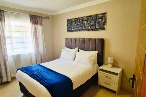 Voodi või voodid majutusasutuse 3 Bed House in Malbereign Harare toas