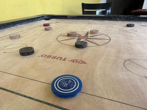 a frisbee game on a ping pong table at Amaluna Resorts in Negombo