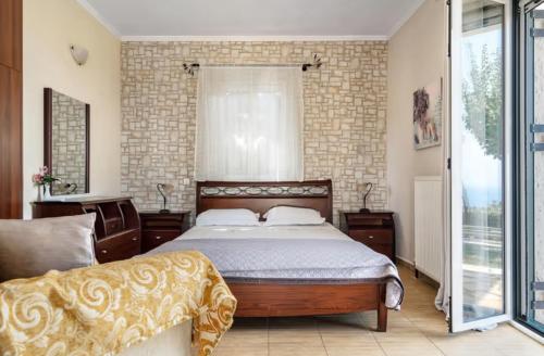 Postel nebo postele na pokoji v ubytování Key Villas