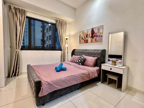 Ένα ή περισσότερα κρεβάτια σε δωμάτιο στο 2BR Apartment @ Icon City