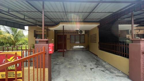 a hallway of a house with a balcony at Segamat Tunas Homestay in Segamat